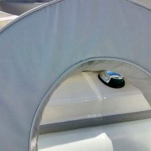 A close up of a white boat with a white ring on it.